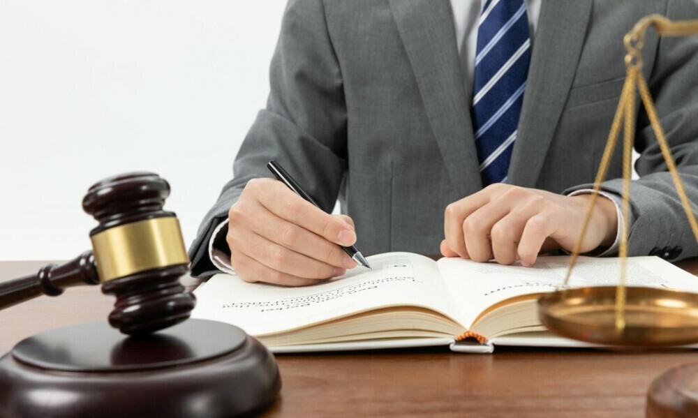 family court judge writing his endorsement in a case