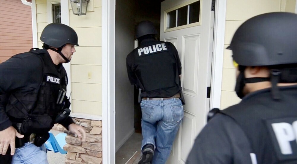 police entering a home